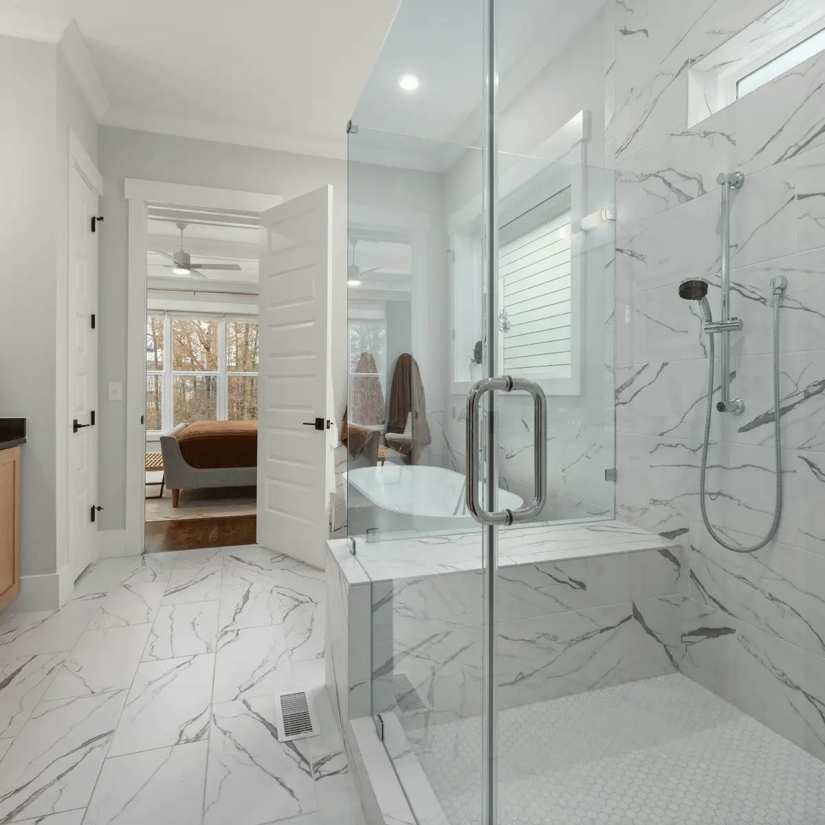 Working with natural marble requires immaculate trade precision, from first-fix plumbing positioning to final slab positioning